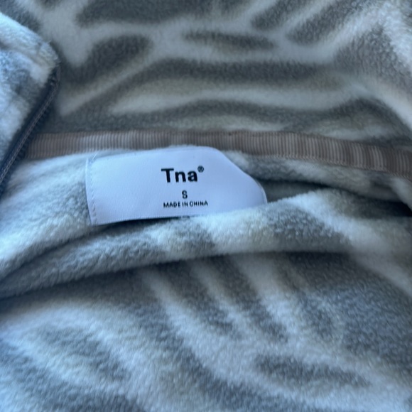 Turn a zebra, psychedelic, small quarter zip. Aritzia perfect condition. - Picture 2 of 3